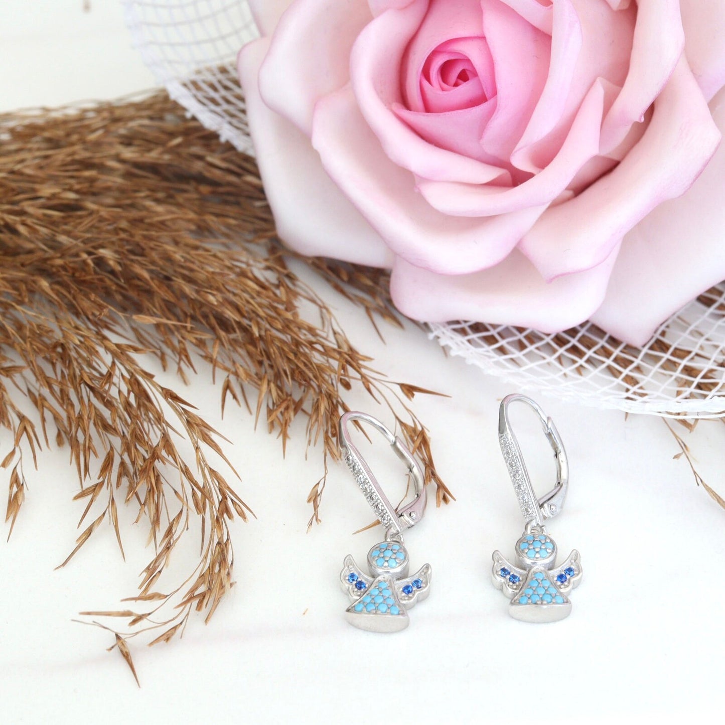Pendientes ángeles de plata, pendientes ángeles de circonitas, pendientes para niña, pendientes ángeles con palanca, pendientes ángeles de circonitas azules