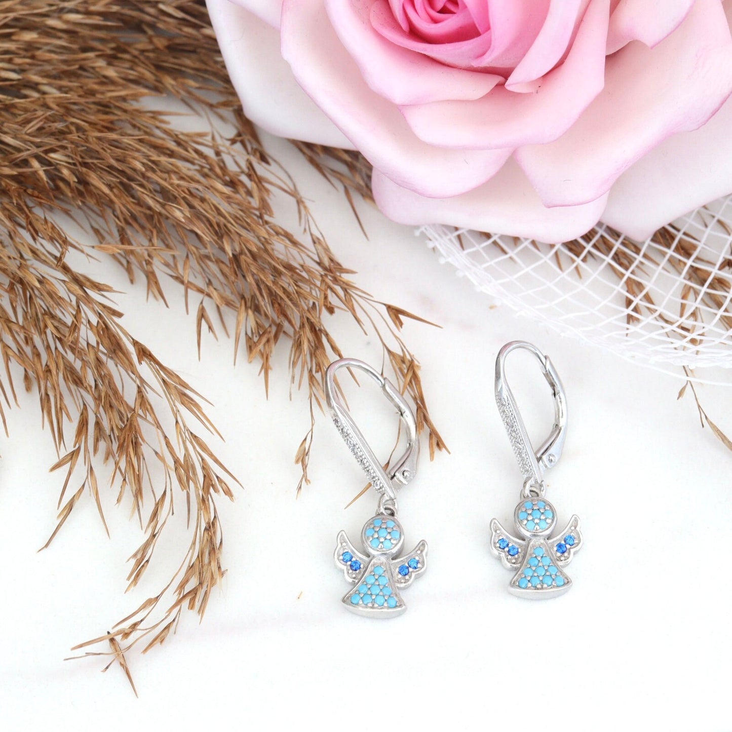 Pendientes ángeles de plata, pendientes ángeles de circonitas, pendientes para niña, pendientes ángeles con palanca, pendientes ángeles de circonitas azules