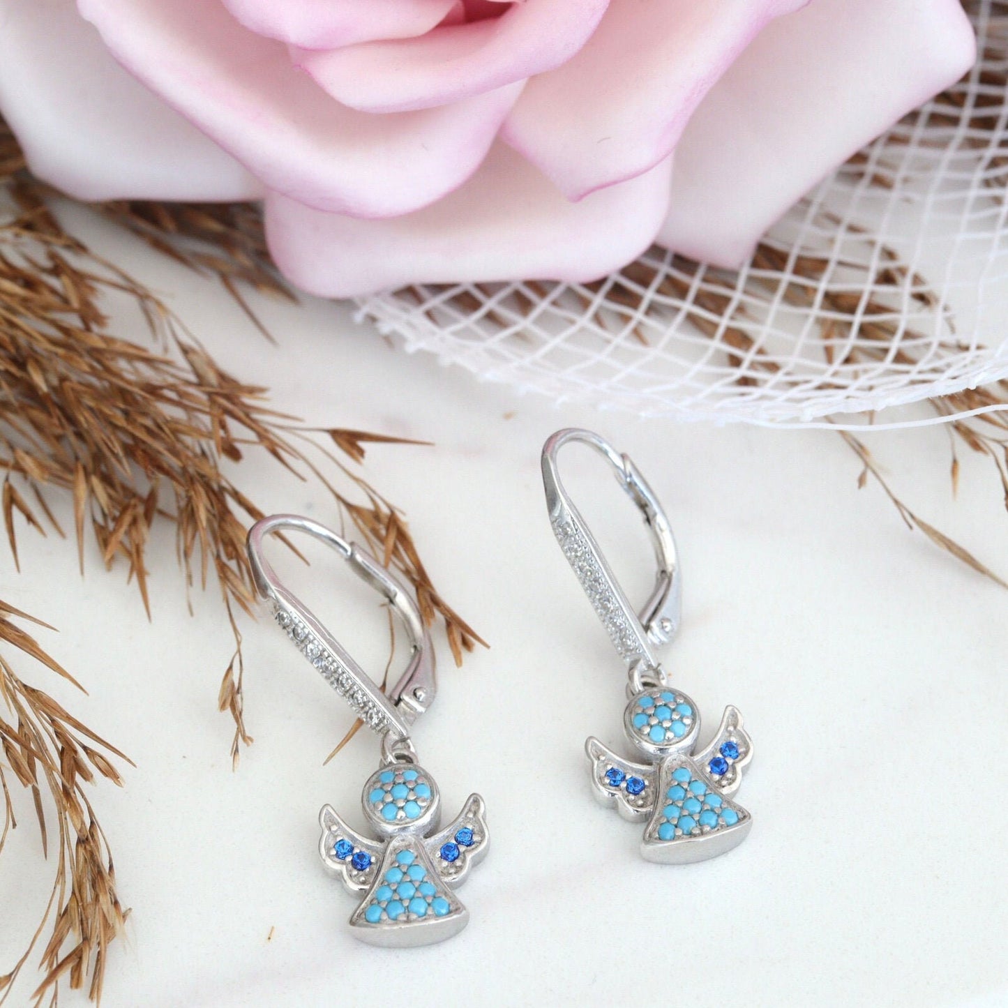 Pendientes ángeles de plata, pendientes ángeles de circonitas, pendientes para niña, pendientes ángeles con palanca, pendientes ángeles de circonitas azules