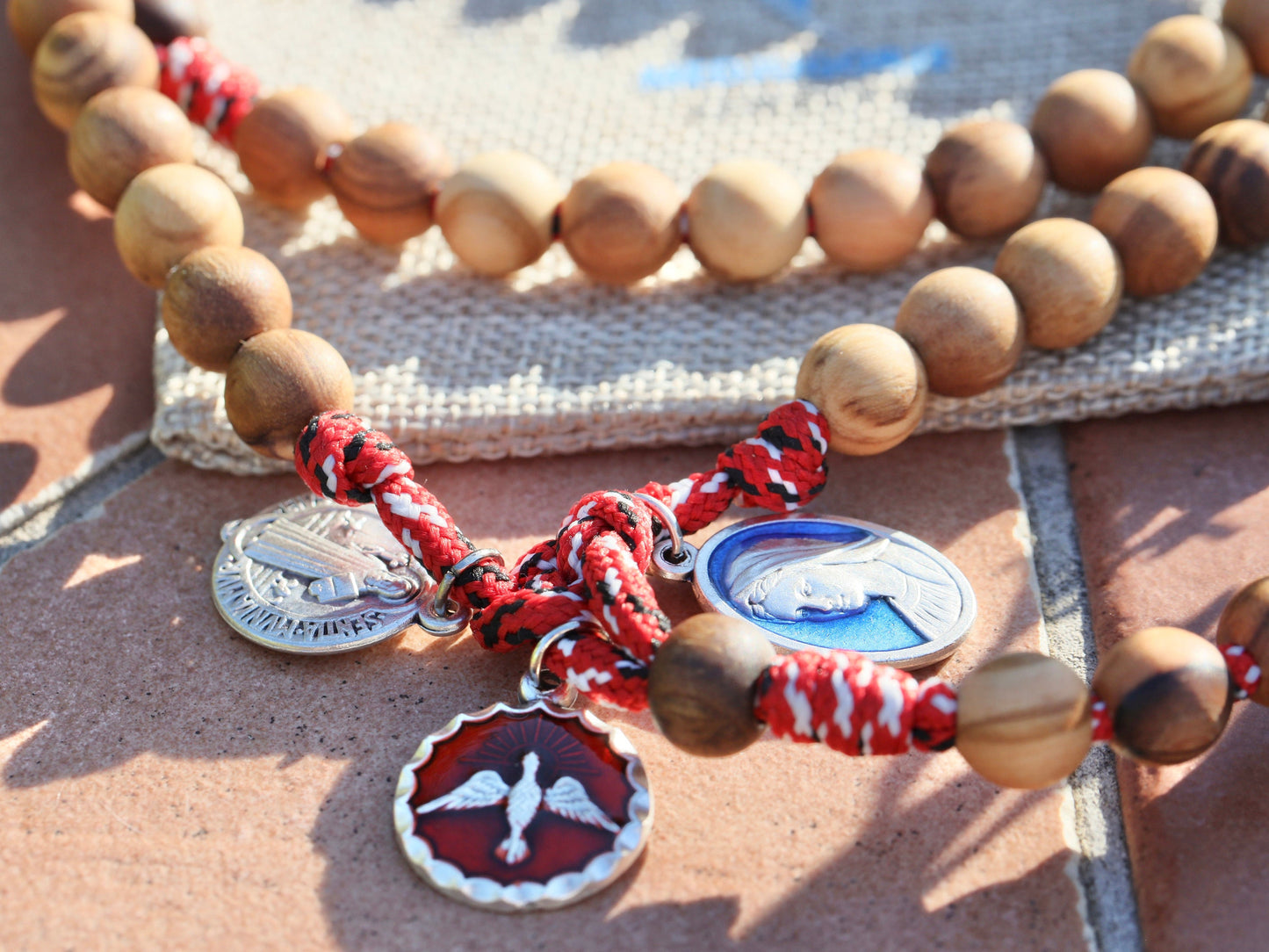 Wooden rosary, paracord rosary, tactical rosary, Holy Spirit, Queen of Peace, Saint Benedict, olive wood comfort cross, meditation rosary